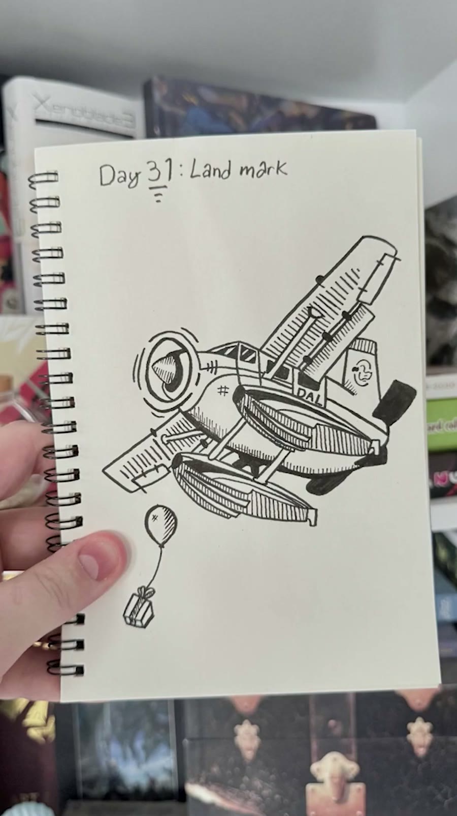 Inktober landmark drawing of the Dodo Airlines plane from Animal Crossing with a balloon.