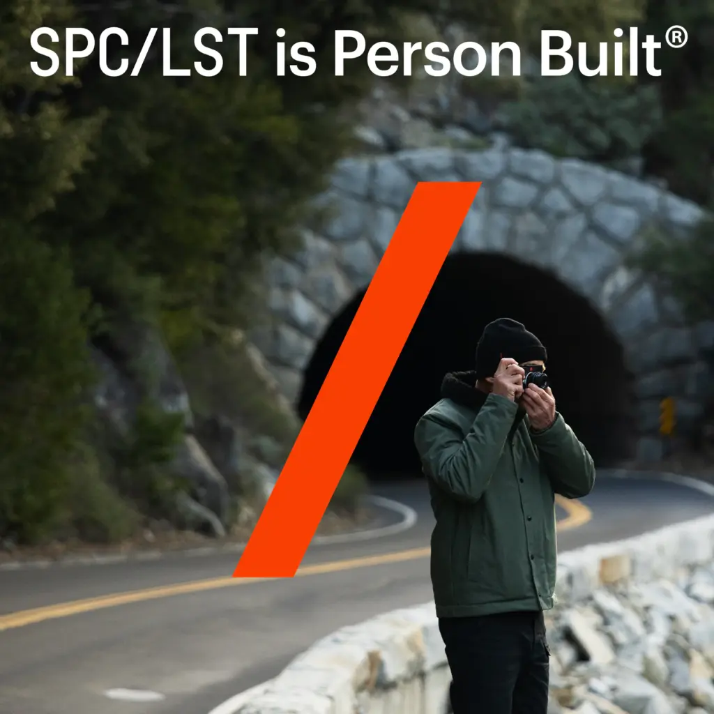 SPC/LST Person Built graphic with a photographer in a mountain setting